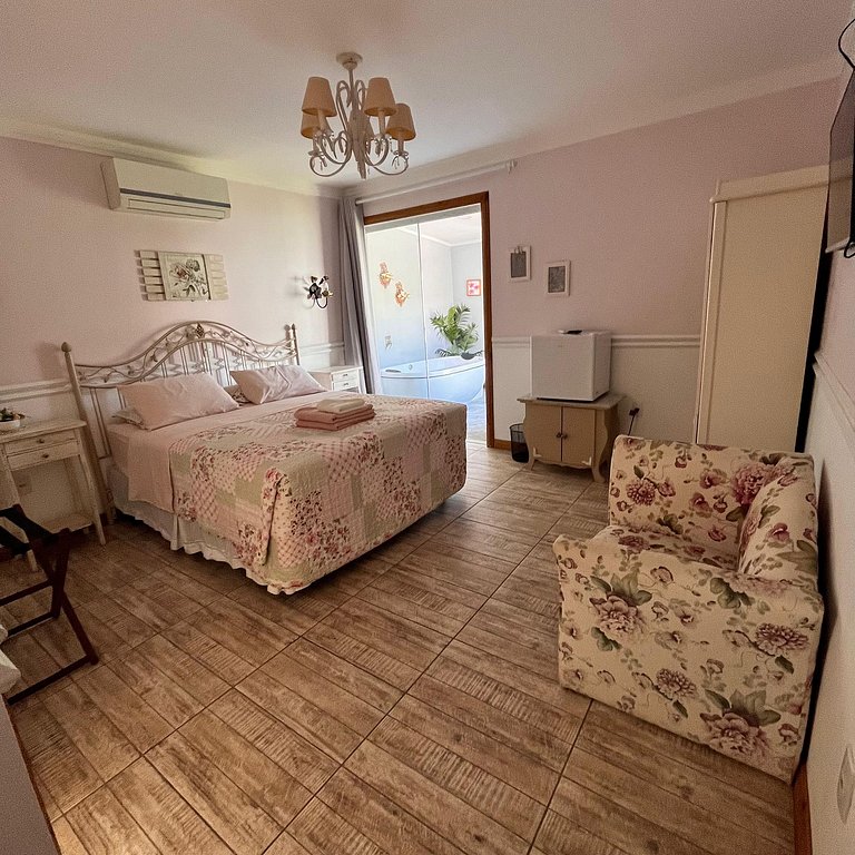 Suíte em pousada de charme em Jurerê