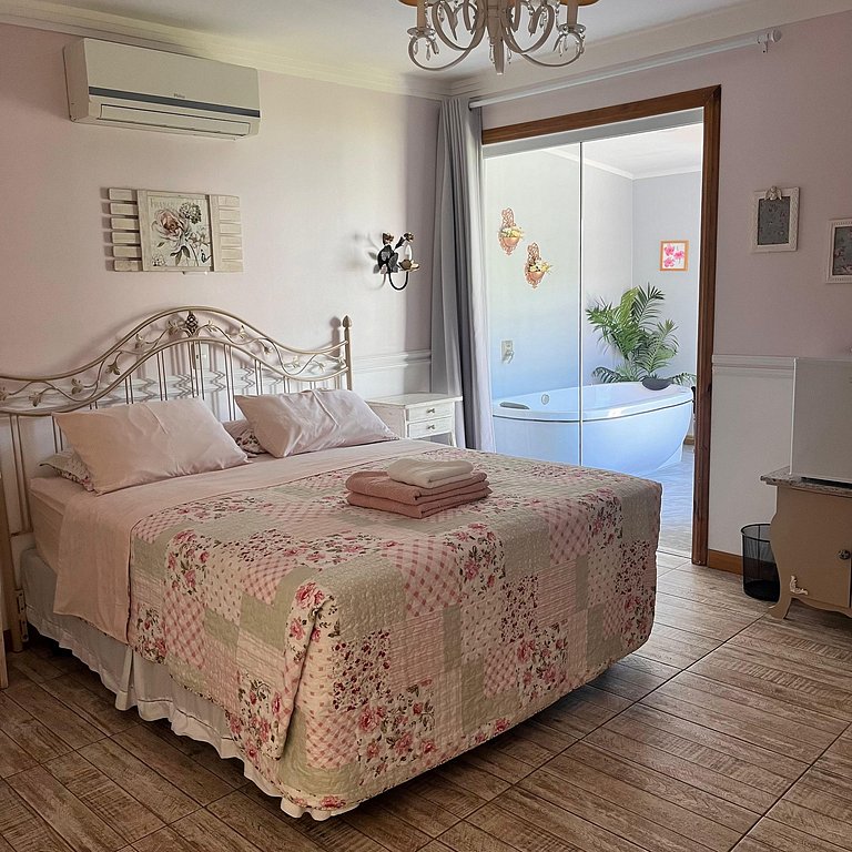 Suíte em pousada de charme em Jurerê